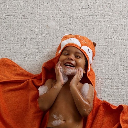 shaw-color-that-speaks-to-you Kid on carpet | Budget Flooring, Inc.